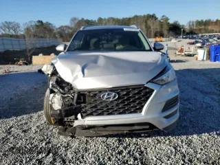 2021 Hyundai Tucson SEL with VIN KM8J33ALXMU310043, listed as a Copart auction lot 45398195 with 139,632 mi miles and Salvage title. Bid and sale history available at DreamBid. Image 5.