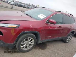 2016 Jeep Cherokee Latitude with VIN 1C4PJLCS1GW247965, listed as a IAAI auction lot 41623805 with 114,187 mi miles. Bid and sale history available at carsss.com. Image 14.