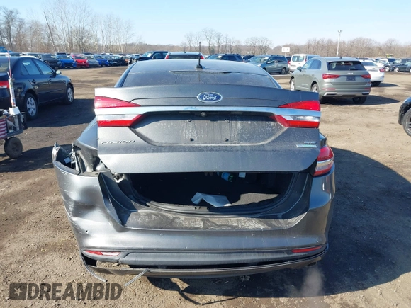 2017 Ford Fusion SE z VIN 3FA6P0HDXHR321008, wystawiony jako IAAI lot #41620779 z przebiegiem 110 116 mil mil oraz . Historia ofert i sprzedaży dostępna na DreamBid. Obrazek 16.