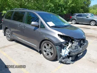 2016 Toyota Sienna SE with VIN 5TDXK3DC8GS755869, listed as a IAAI auction lot 42623098 with 130,465 mi miles and . Bid and sale history available at DreamBid. Image 1.