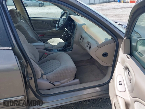 2001 Pontiac Bonneville SE z VIN 1G2HX54K514263686, wystawiony jako IAAI lot #42373637 z przebiegiem Nie podano mil oraz . Historia ofert i sprzedaży dostępna na DreamBid. Obrazek 5.