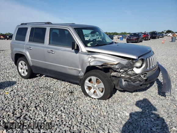 2014 Jeep Patriot Latitude with VIN 1C4NJRFB9ED759908, listed as a Copart auction lot 63874905 with 61,960 mi miles and Salvage title. Bid and sale history available at DreamBid. Image 4.