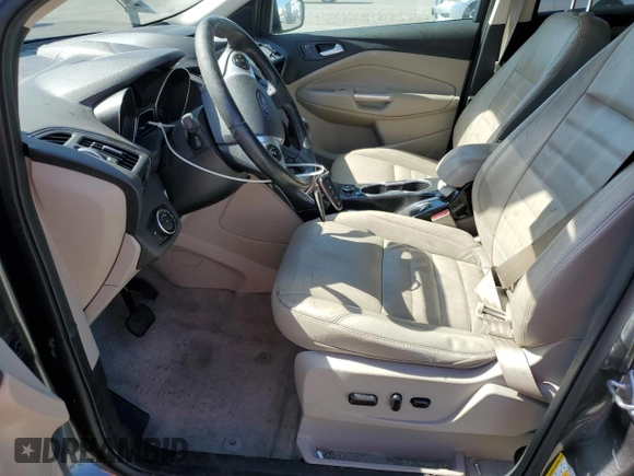 2015 Ford Escape Titanium with VIN 1FMCU9J99FUC13108, listed as a Copart auction lot 60815265 with 70,938 mi miles and Salvage title. Bid and sale history available at DreamBid. Image 7.