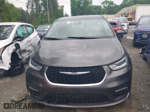 2023 Chrysler Pacifica Hybrid Touring L with VIN 2C4RC1L72PR540902, listed as a IAAI auction lot 42151047 with Not Provided miles and . Bid and sale history available at DreamBid. Image 11.