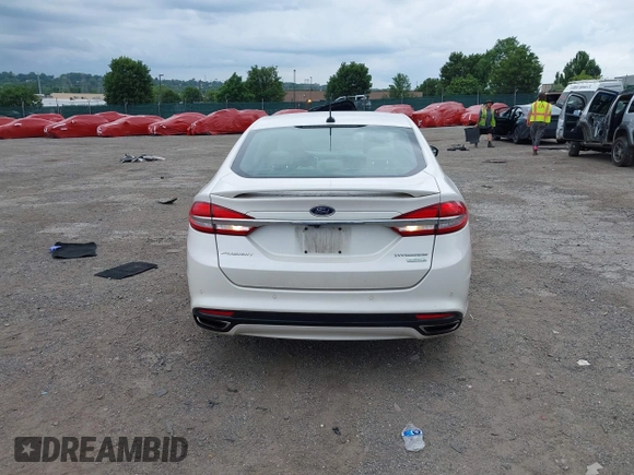 2017 Ford Fusion Titanium with VIN 3FA6P0K96HR115561, listed as a IAAI auction lot 42596030 with 187,865 mi miles and . Bid and sale history available at DreamBid. Image 17.
