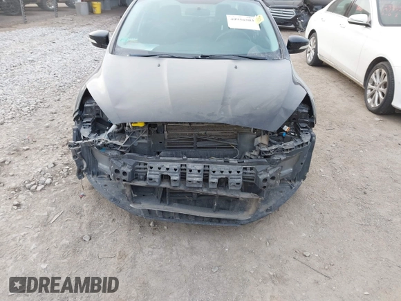 2016 Ford Focus SE z VIN 1FADP3FEXGL310270, wystawiony jako IAAI lot #40956503 z przebiegiem 156 812 mil mil oraz . Historia ofert i sprzedaży dostępna na DreamBid. Obrazek 6.