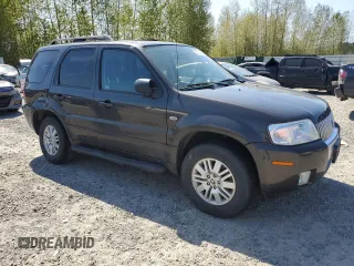 2005 Mercury Mariner Luxury z VIN 4M2CU57135DJ21208, wystawiony jako Copart lot #53555425 z przebiegiem 95 409 mil mil oraz Szkody całkowita. Historia ofert i sprzedaży dostępna na DreamBid. Obrazek 4.