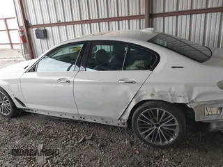 2018 BMW 5 Series 530e with VIN WBAJA9C57JB034128, listed as a IAAI auction lot 41800329 with 66,684 mi miles and . Bid and sale history available at DreamBid. Image 15.
