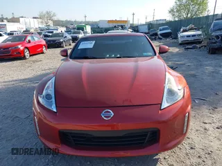 2014 Nissan 370Z Nismo with VIN JN1AZ4EH9EM636340, listed as a IAAI auction lot 42112548 with 143,894 mi miles and . Bid and sale history available at DreamBid. Image 13.
