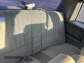 1987 Buick Regal with VIN 1G4GJ11Y4HP413978, listed as a Copart auction lot 87311954 with 52,519 mi miles and Salvage Title. Bid and sale history available at DreamBid. Image 6.