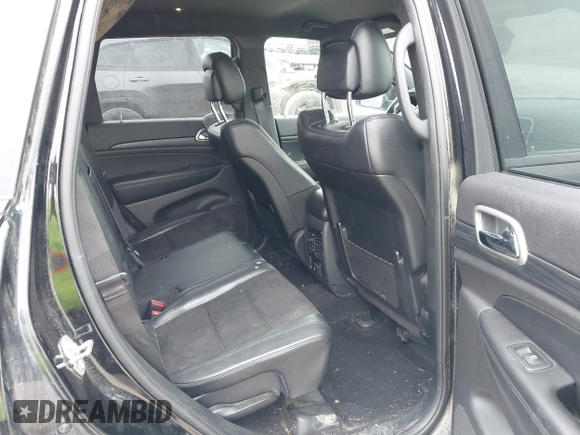 2019 Jeep Grand Cherokee Laredo E with VIN 1C4RJFAGXKC674676, listed as a IAAI auction lot 41942125 with 72,151 mi miles. Bid and sale history available at carsss.com. Image 8.