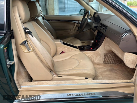 2002 Mercedes-Benz SL 500 with VIN WDBFA68F42F204673, listed as a Copart auction lot 56757525 with 32,967 mi miles and Clean title. Bid and sale history available at DreamBid. Image 6.