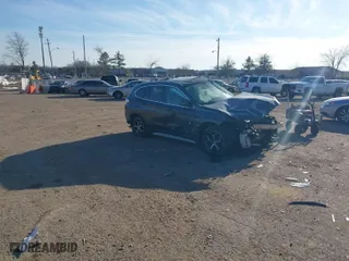 2018 BMW X1 xDrive28i with VIN WBXHT3C37J5K23855, listed as a IAAI auction lot 41442191 with NaN miles. Bid and sale history available at carsss.com. Image 1.