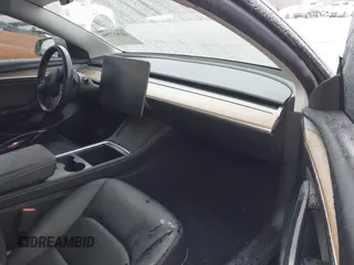 2023 Tesla Model 3 z VIN 5YJ3E1EA3PF579776, wystawiony jako IAAI lot #41537794 z przebiegiem Nie podano mil oraz . Historia ofert i sprzedaży dostępna na DreamBid. Obrazek 5.