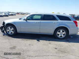 2005 Dodge Magnum z VIN 2D8GZ58235H576127, wystawiony jako IAAI lot #41989680 z przebiegiem 136 488 mil mil oraz . Historia ofert i sprzedaży dostępna na DreamBid. Obrazek 15.