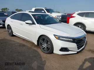2021 Honda Accord Touring with VIN 1HGCV2F9XMA005191, listed as a IAAI auction lot 42088545 with 169,611 mi miles and . Bid and sale history available at DreamBid. Image 1.