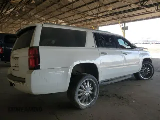 2015 Chevrolet Suburban LT z VIN 1GNSCJKC3FR585391, wystawiony jako Copart lot #88498085 z przebiegiem Nie podano mil oraz Szkoda całkowita • Salvage title. Historia ofert i sprzedaży dostępna na DreamBid. Obrazek 3.