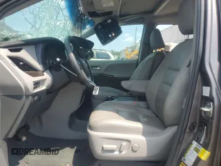 2015 Toyota Sienna XLE with VIN 5TDYK3DC6FS576670, listed as a Copart auction lot 62612345 with 106,475 mi miles and Salvage title. Bid and sale history available at DreamBid. Image 7.