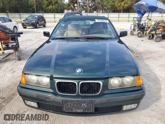 1999 BMW 3 Series z VIN WBABK8330XEY91814, wystawiony jako Copart lot #79799074 z przebiegiem 63 783 mil mil oraz Szkoda całkowita • Salvage title. Historia ofert i sprzedaży dostępna na DreamBid. Obrazek 5.