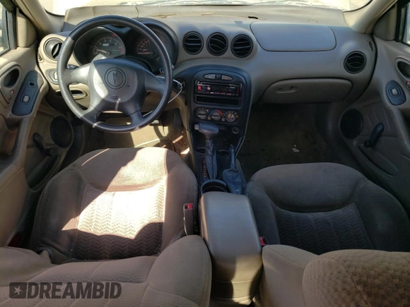 2001 Pontiac Grand Am SE z VIN 1G2NE52T91M583582, wystawiony jako Copart lot #77808974 z przebiegiem 126 219 mil mil oraz Szkoda całkowita • Salvage title. Historia ofert i sprzedaży dostępna na DreamBid. Obrazek 8.