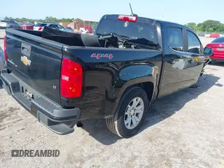 2018 Chevrolet Colorado 4WD LT z VIN 1GCGTCEN0J1265248, wystawiony jako IAAI lot #42247568 z przebiegiem 74 863 mil mil oraz . Historia ofert i sprzedaży dostępna na DreamBid. Obrazek 4.