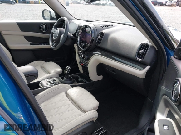 2022 MINI Countryman Cooper S with VIN WMZ83BR0XN3N96765, listed as a IAAI auction lot 42571133 with 22,821 mi miles and . Bid and sale history available at DreamBid. Image 5.
