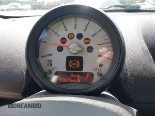 2012 MINI Countryman z VIN WMWZB3C50CWM03467, wystawiony jako IAAI lot #42318106 z przebiegiem 163 289 mil mil oraz . Historia ofert i sprzedaży dostępna na DreamBid. Obrazek 7.