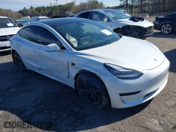 2020 Tesla Model 3 Standard Range Plus with VIN 5YJ3E1EA7LF797150, listed as a IAAI auction lot 41869088 with 75,708 mi miles and . Bid and sale history available at carsss.com. Image 1.