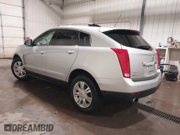 2016 Cadillac SRX Luxury Collection with VIN 3GYFNEE3XGS566210, listed as a IAAI auction lot 42094984 with 99,671 mi miles and . Bid and sale history available at DreamBid. Image 3.