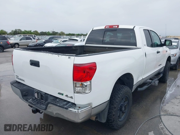 2011 Toyota Tundra 4WD Truck with VIN 5TFUW5F18BX188306, listed as a IAAI auction lot 41898176 with 221,744 mi miles. Bid and sale history available at carsss.com. Image 4.