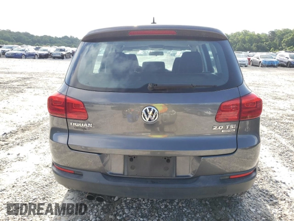 2014 Volkswagen Tiguan S z VIN WVGBV3AX2EW519798, wystawiony jako Copart lot #60316895 z przebiegiem 182 002 mil mil oraz Czysty tytuł • Clean title. Historia ofert i sprzedaży dostępna na DreamBid. Obrazek 6.