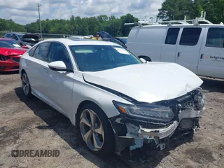 2019 Honda Accord Touring with VIN 1HGCV2F96KA015987, listed as a IAAI auction lot 42528744 with 174,735 mi miles and . Bid and sale history available at DreamBid. Image 1.