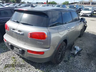2016 MINI Clubman z VIN WMWLN5C56G2E30309, wystawiony jako IAAI lot #41772501 z przebiegiem 67 584 mil mil oraz . Historia ofert i sprzedaży dostępna na DreamBid. Obrazek 4.