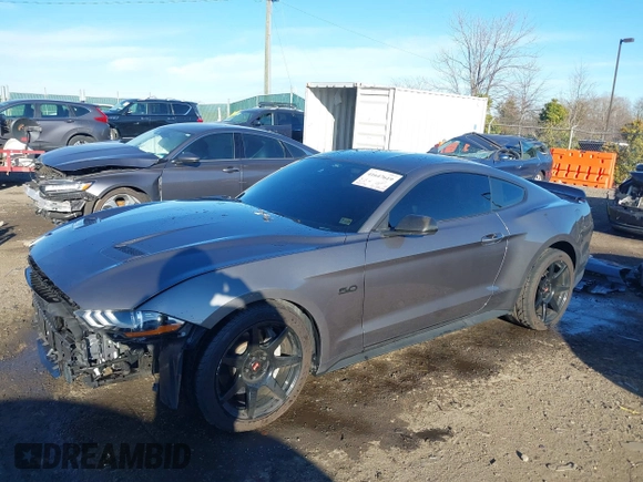 2021 Ford Mustang GT z VIN 1FA6P8CF9M5117126, wystawiony jako IAAI lot #41647619 z przebiegiem 31 076 mil mil oraz . Historia ofert i sprzedaży dostępna na DreamBid. Obrazek 20.
