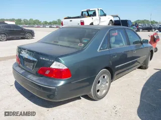 2004 Toyota Avalon XL with VIN 4T1BF28B24U342374, listed as a IAAI auction lot 42042336 with 250,984 mi miles. Bid and sale history available at carsss.com. Image 4.