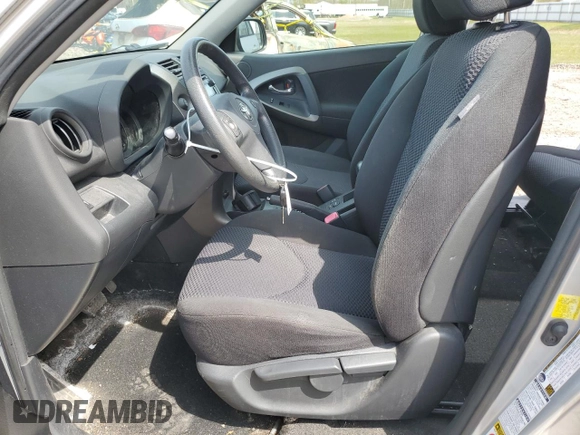 2012 Toyota RAV4 Sport with VIN JTMRF4DV4C5050328, listed as a Copart auction lot 55262145 with 119,204 mi miles and Salvage title. Bid and sale history available at DreamBid. Image 7.
