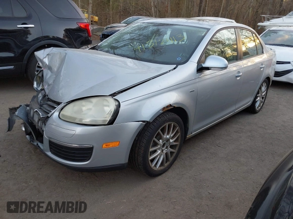 2009 Volkswagen Jetta Wolfsburg Edition with VIN 3VWRJ71K19M027857, listed as a IAAI auction lot 41312413 with 150,335 mi miles and . Bid and sale history available at DreamBid. Image 2.
