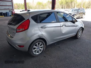 2013 Ford Fiesta SE with VIN 3FADP4EJ2DM173842, listed as a IAAI auction lot 42048262 with 82,637 mi miles. Bid and sale history available at carsss.com. Image 4.