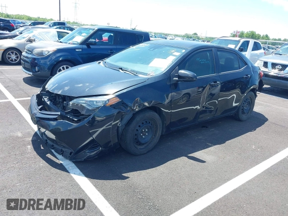 2019 Toyota Corolla L with VIN 5YFBURHE4KP860848, listed as a IAAI auction lot 42167529 with 152,301 mi miles. Bid and sale history available at carsss.com. Image 2.