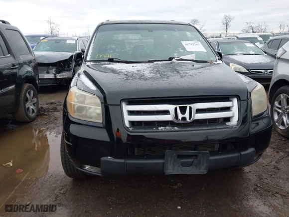 2007 Honda Pilot EX-L with VIN 5FNYF28557B028997, listed as a IAAI auction lot 41742267 with 217,114 mi miles. Bid and sale history available at carsss.com. Image 14.