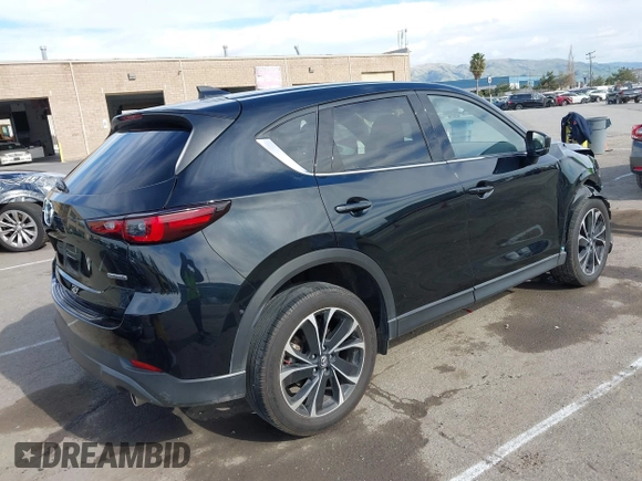 2023 Mazda CX-5 2.5 S Premium Package with VIN JM3KFBDM4P0266378, listed as a IAAI auction lot 41655712 with 31,746 mi miles. Bid and sale history available at carsss.com. Image 4.