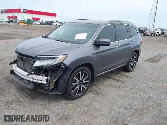 2019 Honda Pilot Touring 8-Passenger with VIN 5FNYF5H93KB028641, listed as a IAAI auction lot 42524078 with 56,744 mi miles and . Bid and sale history available at DreamBid. Image 20.