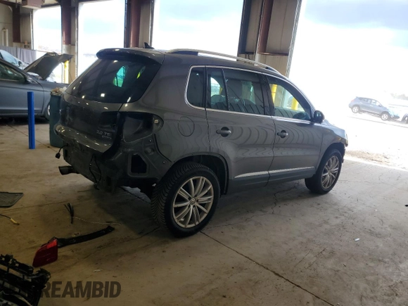 2015 Volkswagen Tiguan SE z VIN WVGBV7AX0FW588451, wystawiony jako Copart lot #51005345 z przebiegiem 104 553 mil mil oraz Szkoda całkowita • Salvage title. Historia ofert i sprzedaży dostępna na DreamBid. Obrazek 3.