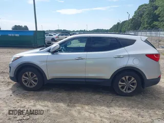 2016 Hyundai Santa Fe z VIN 5XYZU3LB3GG341634, wystawiony jako IAAI lot #42690921 z przebiegiem 149 571 mil mil oraz . Historia ofert i sprzedaży dostępna na DreamBid. Obrazek 14.