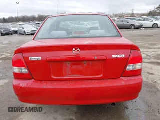 2000 Mazda Protege DX with VIN JM1BJ2224Y0277889, listed as a IAAI auction lot 41160593 with 124,586 mi miles and . Bid and sale history available at DreamBid. Image 16.