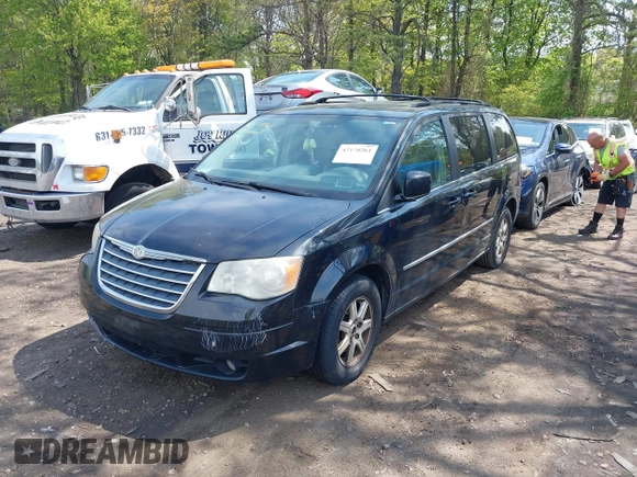 2010 Chrysler Town & Country Touring with VIN 2A4RR5D12AR359509, listed as a IAAI auction lot 42178261 with 160,707 mi miles and . Bid and sale history available at DreamBid. Image 2.