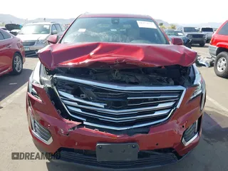 2017 Cadillac XT5 Luxury FWD with VIN 1GYKNBRS4HZ216364, listed as a IAAI auction lot 41877671 with 83,931 mi miles and . Bid and sale history available at DreamBid. Image 6.