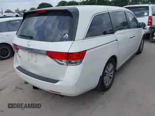 2015 Honda Odyssey EX-L z VIN 5FNRL5H60FB102770, wystawiony jako IAAI lot #42147486 z przebiegiem 160 958 mil mil oraz . Historia ofert i sprzedaży dostępna na DreamBid. Obrazek 4.