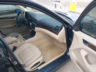 2002 BMW 3 Series 325i with VIN WBAET37412NG78995, listed as a IAAI auction lot 41965274 with 131,138 mi miles. Bid and sale history available at carsss.com. Image 5.