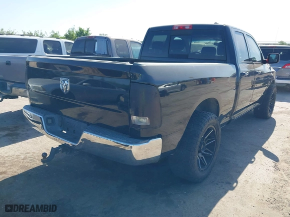 2009 Dodge Ram 1500 SLT with VIN 1D3HB18T19S764885, listed as a IAAI auction lot 41981930 with 157,536 mi miles. Bid and sale history available at carsss.com. Image 4.
